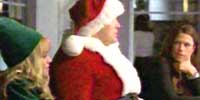 She’s my elf. Sometimes, especially after Santa’s been drinking, he needs a little helper.